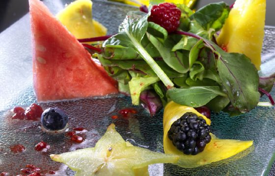 Seasonal fruit salad with raspberry vinaigrette